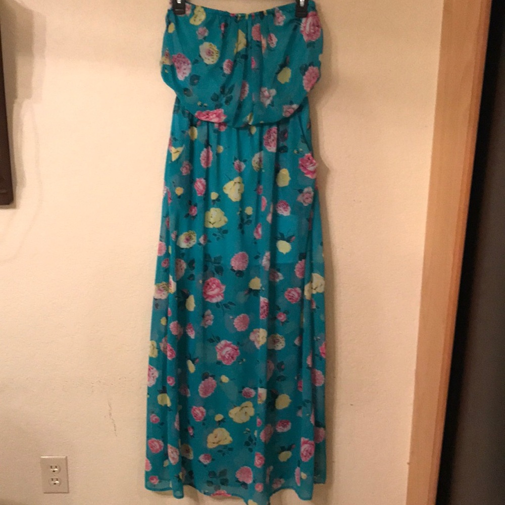 Blue sleeveless maxi dress.